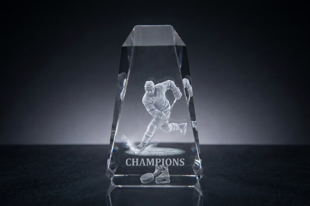 Custom crystal trophy inspired by NHL Awards 2026 — 3D laser engraved optical crystal award by Crystal Sensations